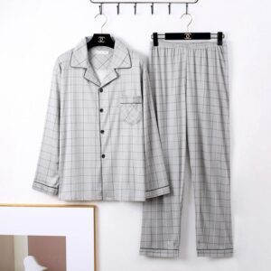 afe27afd-b132-46f3-91ff-18292de0b9a8.jpg Man relaxing in a comfortable and stylish mens long sleeve pajama terno.