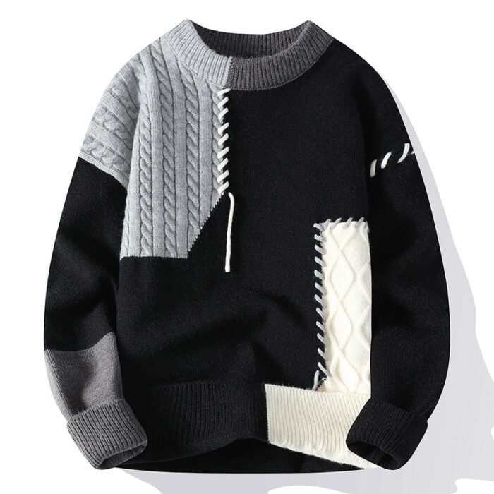 Handsome young man wearing a stylish mens colorblock pullover sweater.