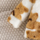 Adorable baby wearing a cozy milky white baby bear velvet terno set.