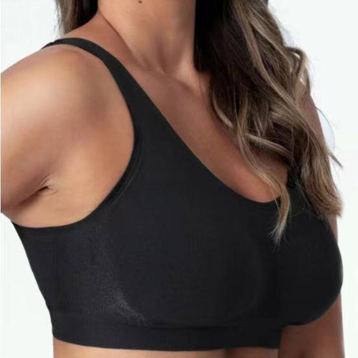 Woman wearing a premium plus size comfortable lifting bra, providing seamless wire-free support for large busts.