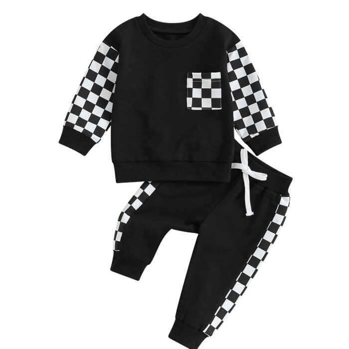Stylish toddler boy wearing a cool boys checkered sweater terno set.