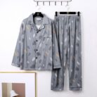 Man relaxing in a comfortable and stylish mens long sleeve pajama terno.