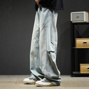 Stylish young man wearing trendy mens wide leg denim cargo pants.
