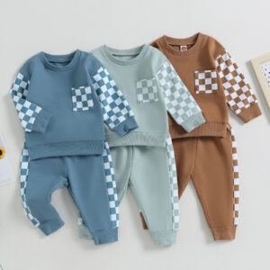 Stylish toddler boy wearing a cool boys checkered sweater terno set.