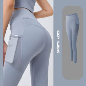 Woman wearing high-waisted black workout leggings with deep side pockets.