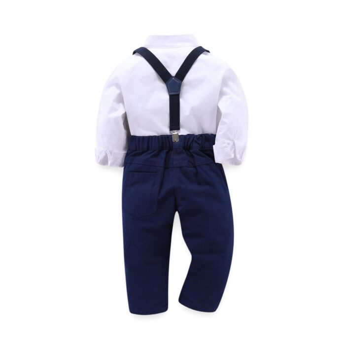 Handsome little boy dressed in a stylish boys formal gentleman terno.