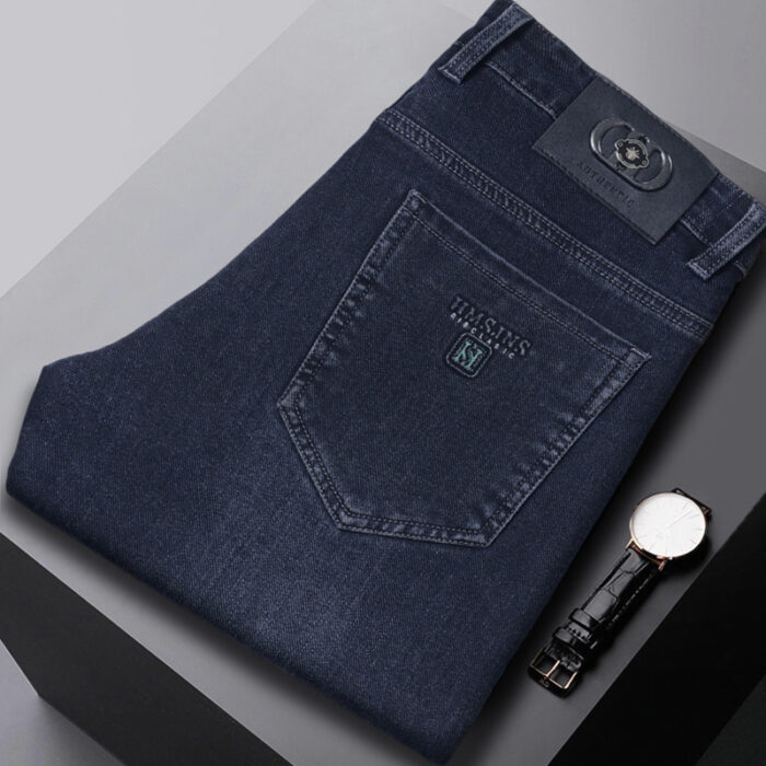 A stylish man wearing comfortable mens straight leg jeans ph for a business casual look.