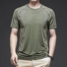 A man staying cool in the summer heat wearing a breathable mens ice silk t shirt.