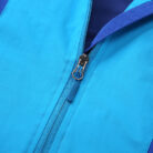 Close-up of the ultra-soft brushed fabric and sturdy zipper on a youth lightweight fall coat.
