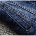 A stylish woman wearing a versatile womens slim fit denim jacket for a casual everyday look.