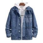 A stylish man wearing a versatile mens hooded denim jacket for a casual layered streetwear look.