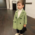 A cute toddler wearing a stylish toddler fall and winter coat for cold weather.
