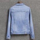 A stylish woman wearing a versatile womens slim fit denim jacket for a casual everyday look.