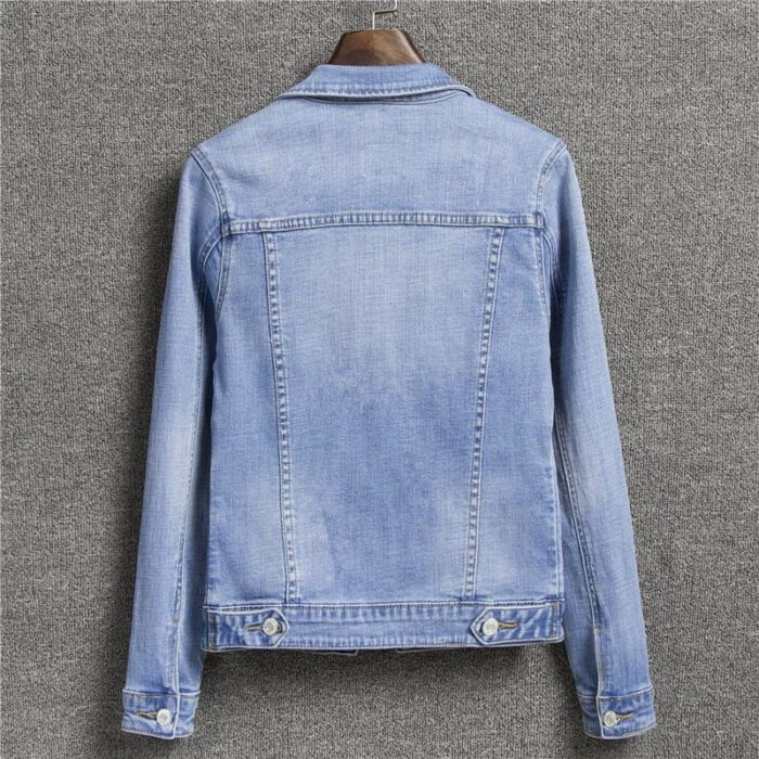 A stylish woman wearing a versatile womens slim fit denim jacket for a casual everyday look.