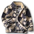 A happy child wearing a comfortable kids lightweight zip up jacket ready for outdoor play.