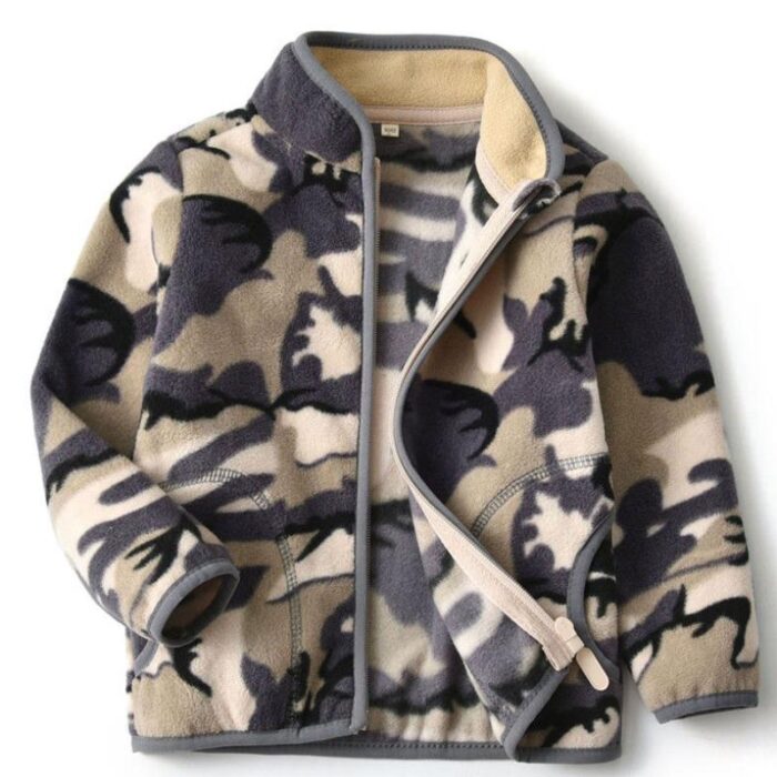 12352181918162.jpg A happy child wearing a comfortable kids lightweight zip up jacket ready for outdoor play.