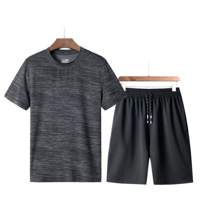 1495878211300.jpg Athletic man working out wearing a breathable mens sports terno set.