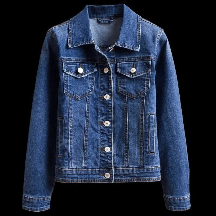 A stylish woman wearing a versatile womens slim fit denim jacket for a casual everyday look.