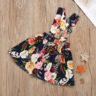 Cute little girl wearing a pink girls suspender skirt terno.