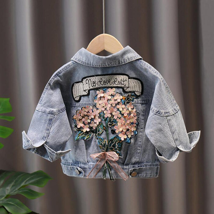 1618051926855.jpg A stylish little girl wearing a versatile girls denim jacket for a cute everyday look.