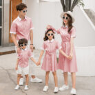 Happy family wearing comfortable family matching striped terno outfits