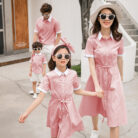 Happy family wearing comfortable family matching striped terno outfits