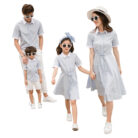 Happy family wearing comfortable family matching striped terno outfits