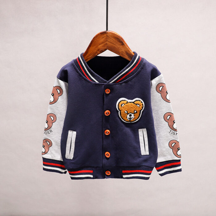 A happy child wearing a comfortable kids lightweight jacket ready for outdoor play.