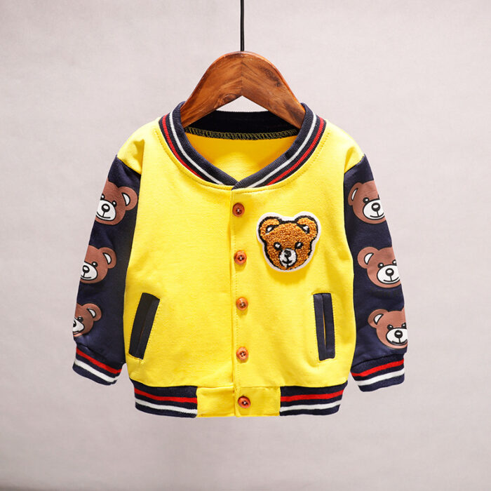 A happy child wearing a comfortable kids lightweight jacket ready for outdoor play.