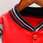 A happy child wearing a comfortable kids lightweight jacket ready for outdoor play.