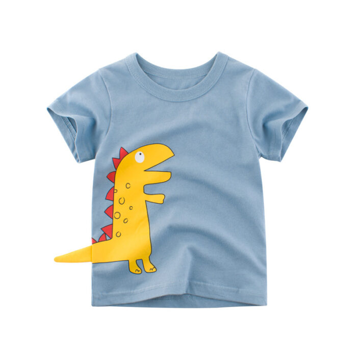 A happy little boy wearing a cute kids dinosaur shirt for summer play.