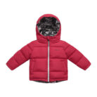 Close-up of the thick thermal cotton insulation and smooth zipper on a kids padded winter jacket.