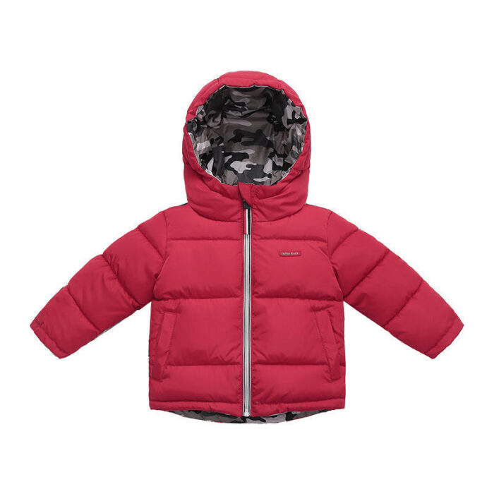 Close-up of the thick thermal cotton insulation and smooth zipper on a kids padded winter jacket.
