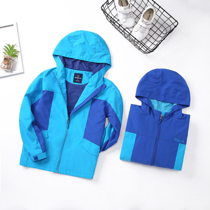 A stylish older child wearing a comfortable kids casual autumn jacket for a crisp fall day.