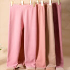 Stylish woman staying warm in thick womens thermal winter leggings for travel.