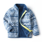 A happy child wearing a comfortable kids lightweight zip up jacket ready for outdoor play.