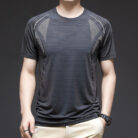 A man staying cool in the summer heat wearing a breathable mens ice silk t shirt.