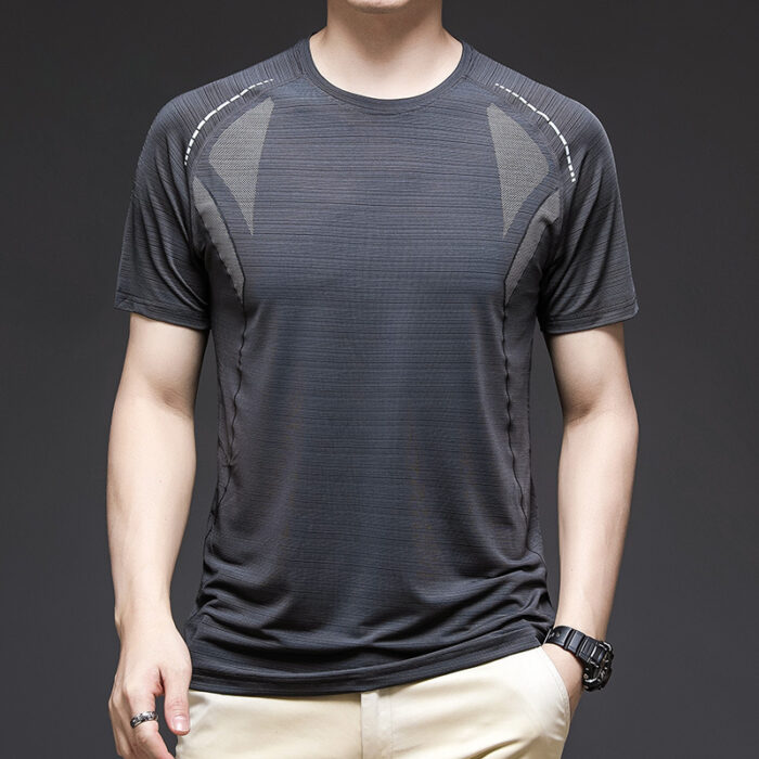A man staying cool in the summer heat wearing a breathable mens ice silk t shirt.