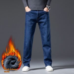 Handsome young man wearing comfortable mens straight leg jeans.