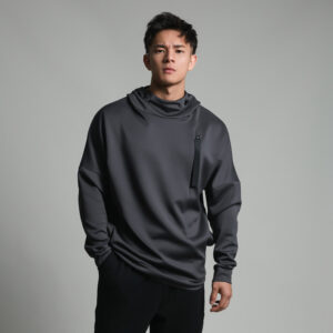 Stylish young man wearing a trendy mens loose high neck sweater.