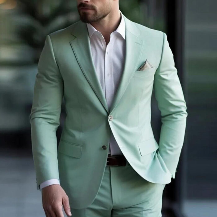1c4433dd-a8f9-449b-9613-397206f61e67.jpg Handsome young man wearing a stylish mens slim fit two piece suit.