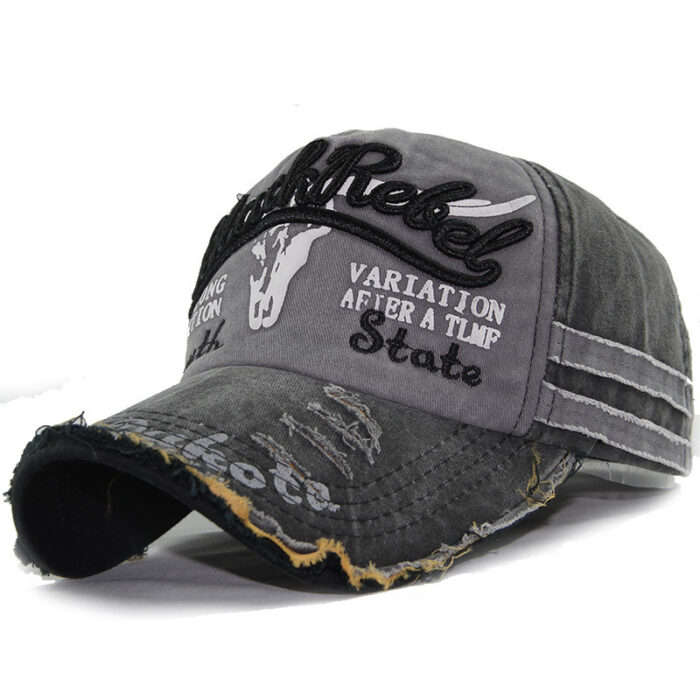 Close-up of the premium breathable cotton and classic curved brim on a distressed classic dad hat.