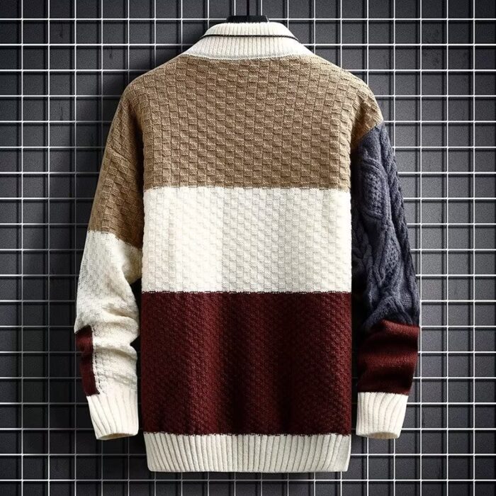 Stylish young man wearing a trendy mens korean style sweater.