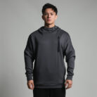 Stylish young man wearing a trendy mens loose high neck sweater.