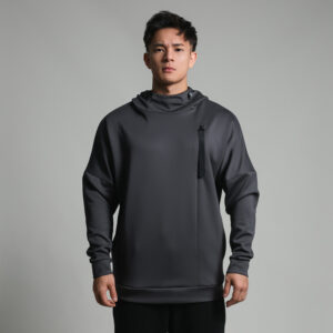 Stylish young man wearing a trendy mens loose high neck sweater.