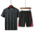 Athletic man working out wearing a breathable mens sports terno set.