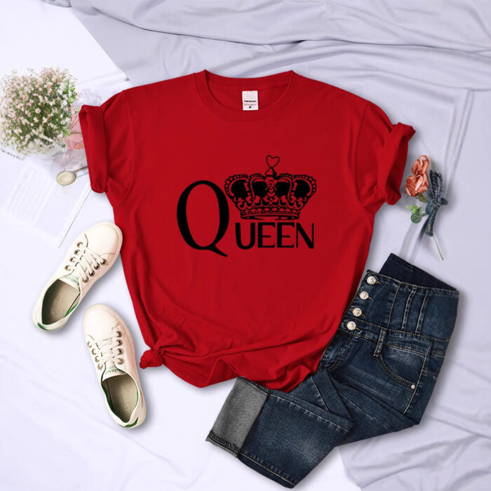 24d19b27-4760-4fe2-bd1e-0ee5431ad641.jpg Close-up of the bold crown print and breathable fabric on a crown print cotton shirt.