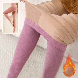 Stylish woman staying warm in thick womens thermal winter leggings for travel.