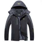 Close-up of the thick faux fur collar and weather-resistant shell on a mens fleece lined winter jacket.