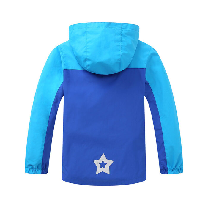 Close-up of the ultra-soft brushed fabric and sturdy zipper on a youth lightweight fall coat.